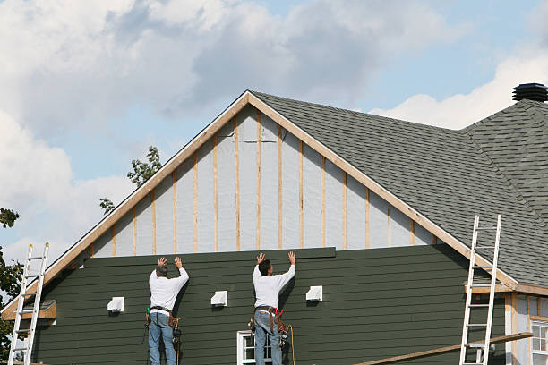 Professional Siding Installation technician working in Clarksburg, MD